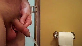 Guy taking a quick pee